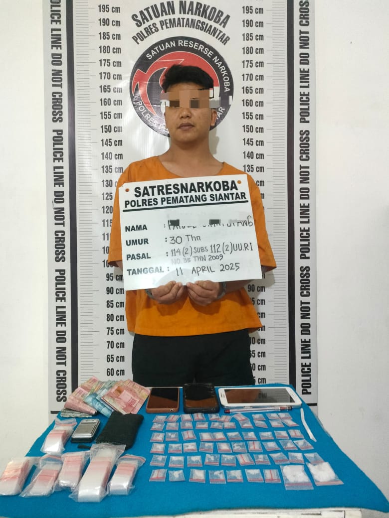 Foto : Tersangka