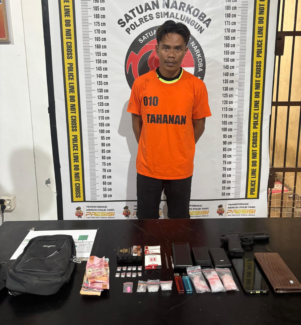 Foto : Tersangka dan barang bukti 