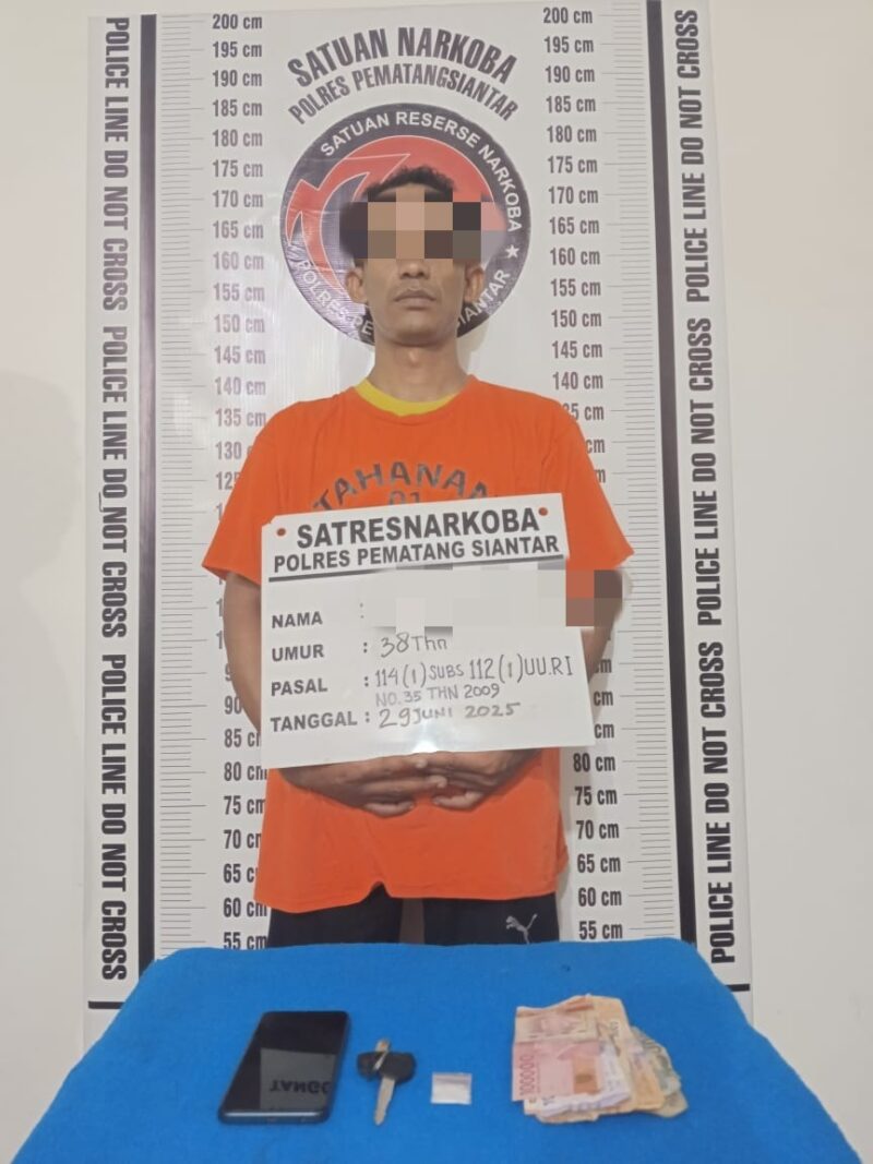 Foto : Tersangka