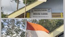 Foto : terlihat bendera merah putih robek,luntur dan kusam berkibar di kantor pangulu nagori Dolok Saribu kecamatan Dolok Pardamean Kabupaten Simalungun. 