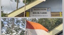 Foto : terlihat bendera merah putih robek,luntur dan kusam berkibar di kantor pangulu nagori Dolok Saribu kecamatan Dolok Pardamean Kabupaten Simalungun. 