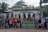Foto : Komandan Koramil (Danramil) 11/ Simpang Empat Kapten Inf. Hamlet Marpaung beserta anggota, Pemdes Sipaku Area, Ormas IPK Sipaku Area dan Masyarakat