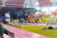 Foto : Di duga Permainan yang berbau Judi di pasar malam. 