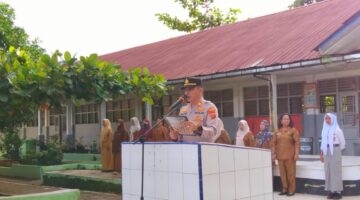 Kapolsek Salapian Jadi Pembina Upacara di SMA Negeri 1 Salapian, Tekankan Disiplin dan Bahaya Narkoba